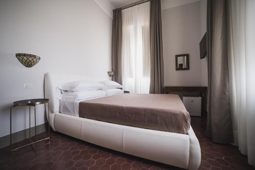 Letto o letti in una camera di Villa Giordanelli