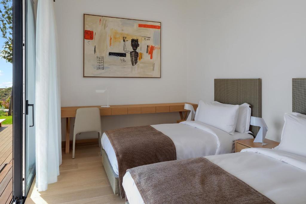Postel nebo postele na pokoji v ubytování Six Senses Kaplankaya