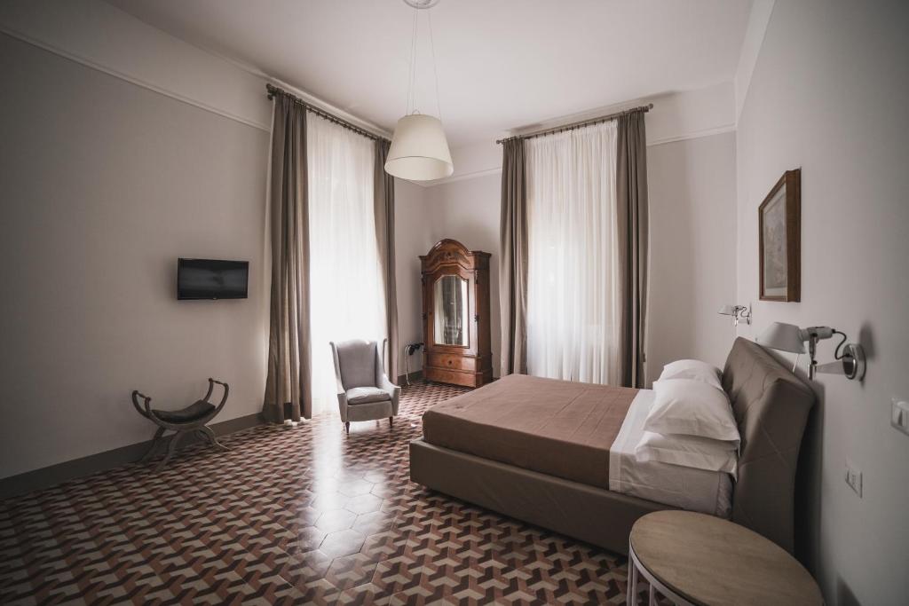 Letto o letti in una camera di Villa Giordanelli
