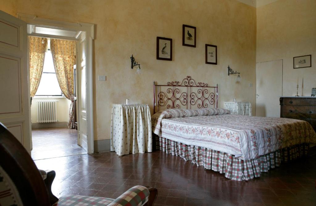 Postel nebo postele na pokoji v ubytování Badia a Coltibuono Wine Resort