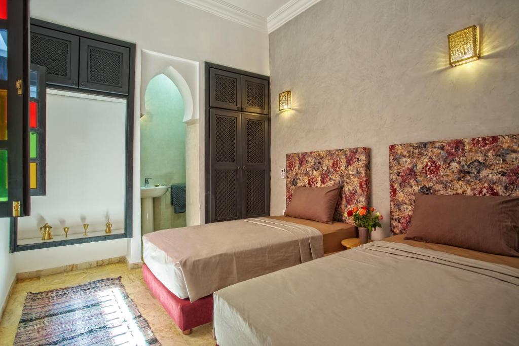 Postel nebo postele na pokoji v ubytování Riad Leila Marrakech