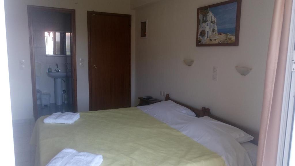 Postel nebo postele na pokoji v ubytování Pansion Chrisa