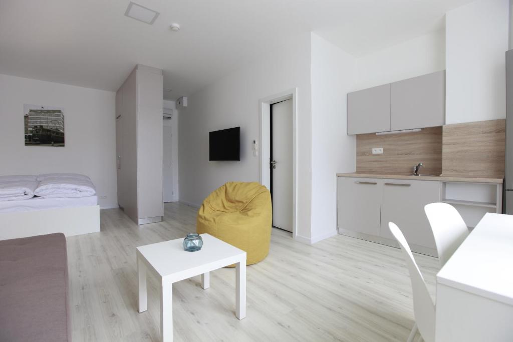 TV a/nebo společenská místnost v ubytování City Center Best Place Apartments