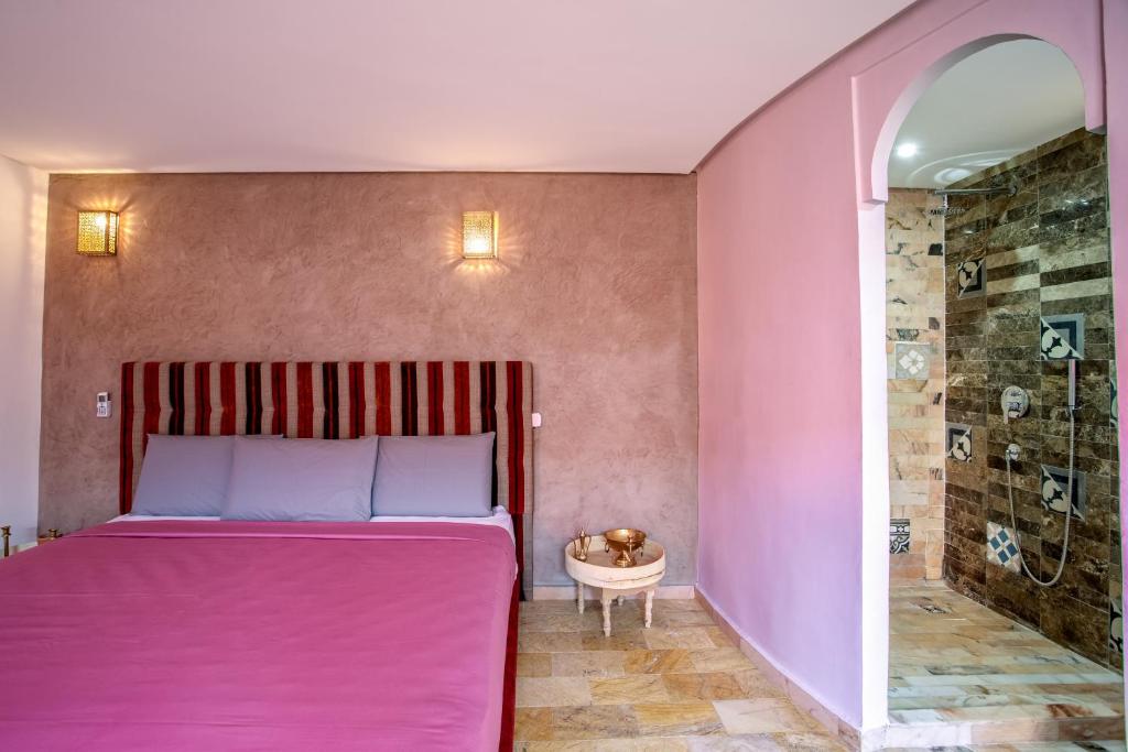 Postel nebo postele na pokoji v ubytování Riad Leila Marrakech