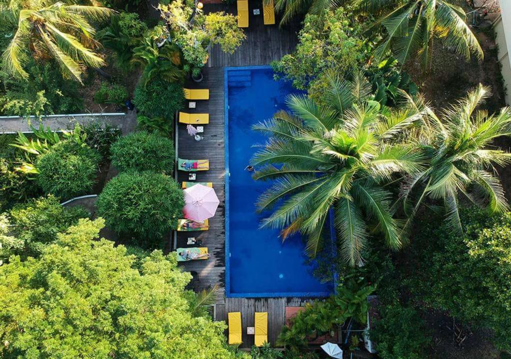 an aerial view of a swimming pool in a garden at Sambor Village Hotel in Kompong Thom