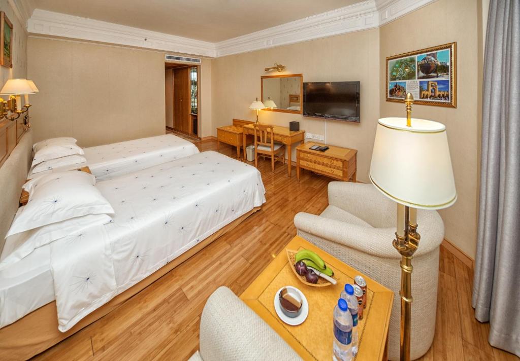 Postel nebo postele na pokoji v ubytování Hotel Silverland