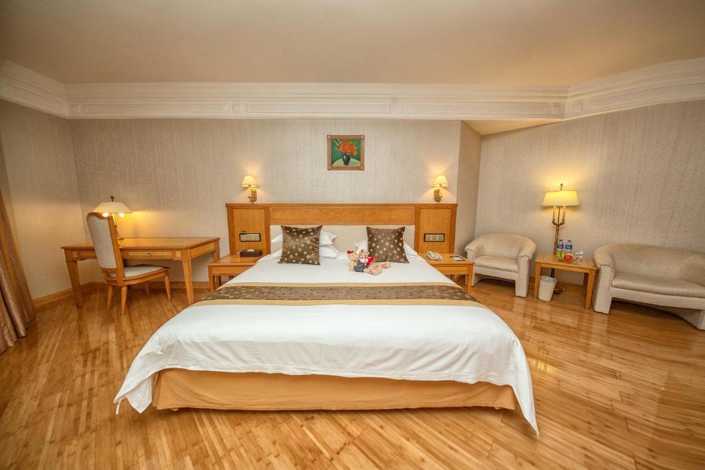 Postel nebo postele na pokoji v ubytování Hotel Silverland
