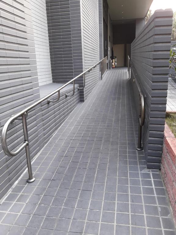 a walkway leading up to a building at Hotel Intrendy in Taishan