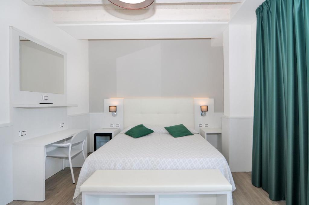 Postel nebo postele na pokoji v ubytování Hotel Austria