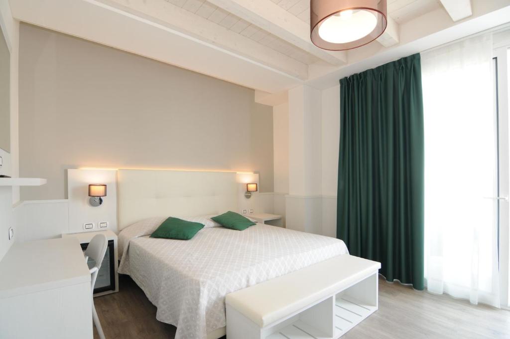 Postel nebo postele na pokoji v ubytování Hotel Austria