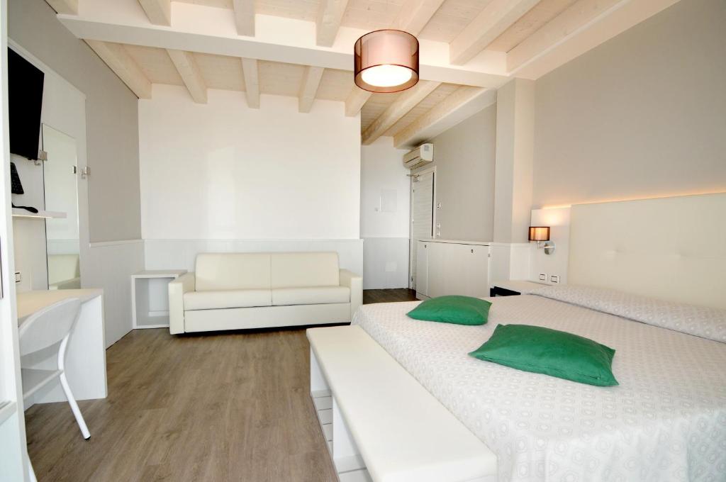 Postel nebo postele na pokoji v ubytování Hotel Austria