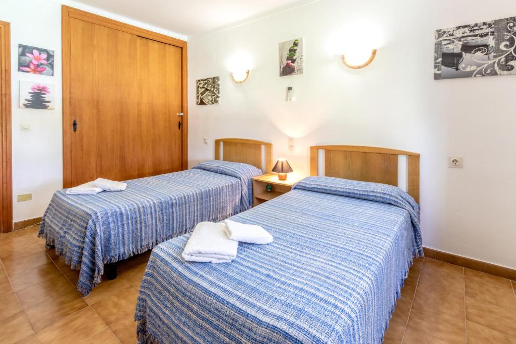 Postel nebo postele na pokoji v ubytování Villa Sol Roma