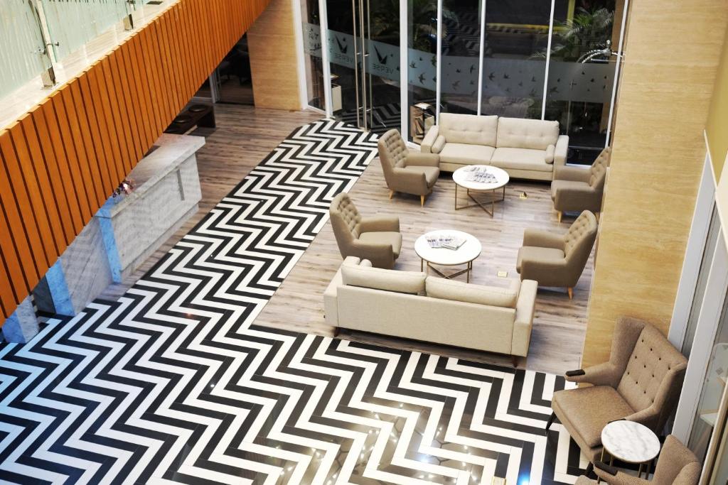 Posezení v ubytování Verse Luxe Hotel Wahid Hasyim