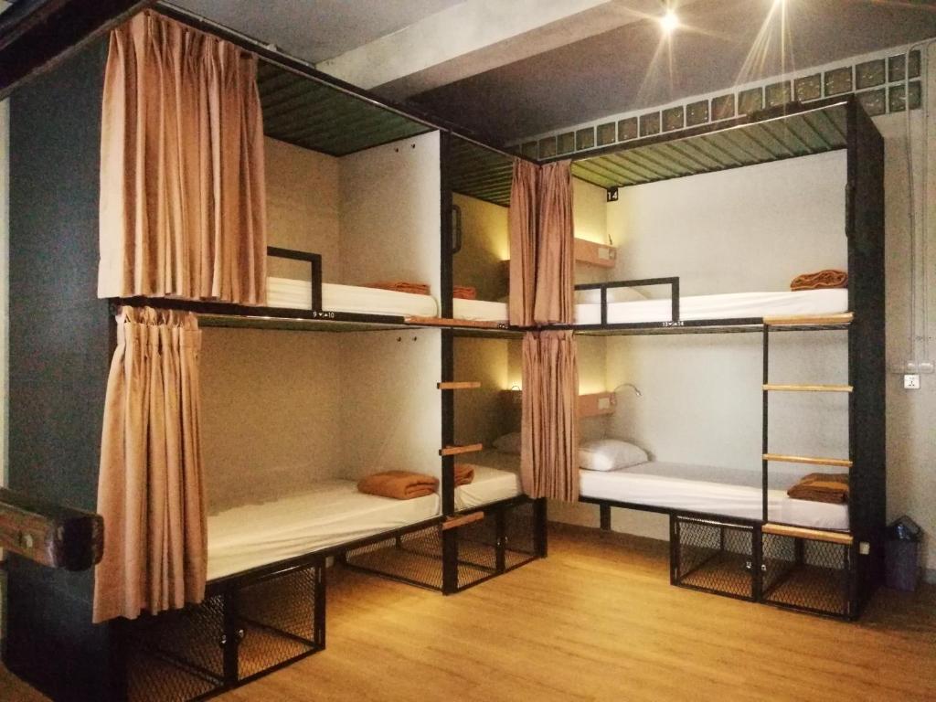 Ένα ή περισσότερα κρεβάτια σε δωμάτιο στο PINX'S HOSTEL