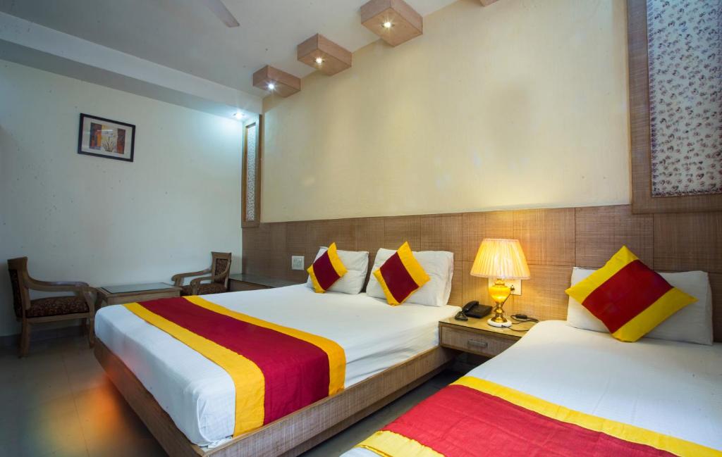 Postel nebo postele na pokoji v ubytování Hotel Baba Inn-By RCG Hotels