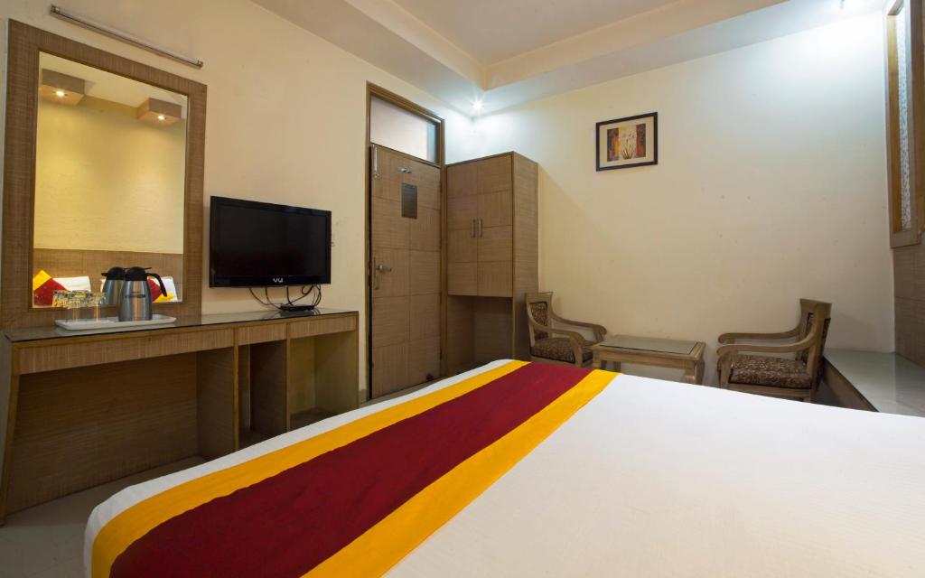 TV a/nebo společenská místnost v ubytování Hotel Baba Inn-By RCG Hotels