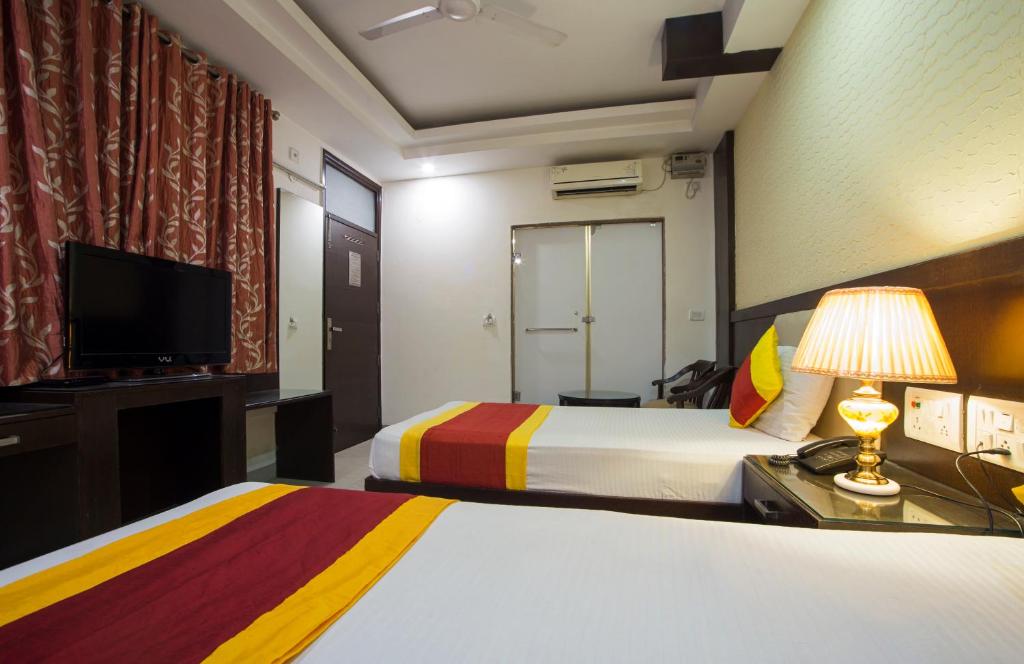 Postel nebo postele na pokoji v ubytování Hotel Baba Inn-By RCG Hotels
