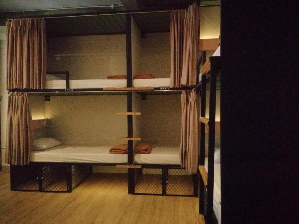 Ένα ή περισσότερα κρεβάτια σε δωμάτιο στο PINX'S HOSTEL