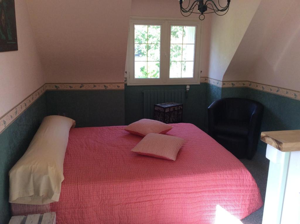 Postel nebo postele na pokoji v ubytování chambre au calme a Botquelen