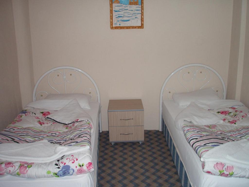 Postel nebo postele na pokoji v ubytování Hotel Pamukkale