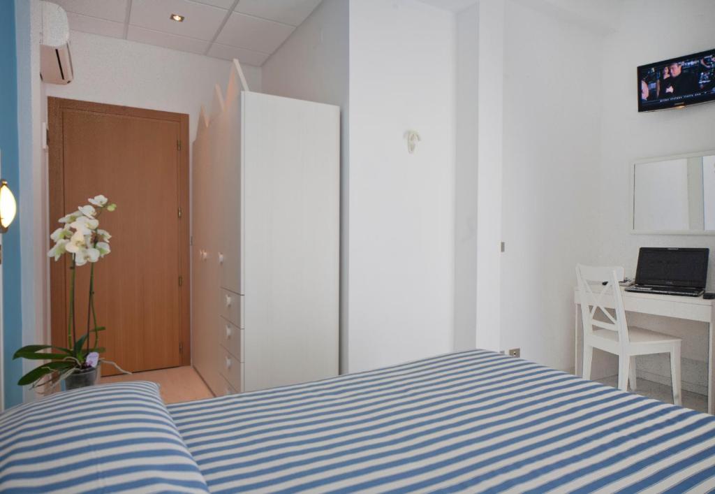 TV a/nebo společenská místnost v ubytování Hotel Marilinda