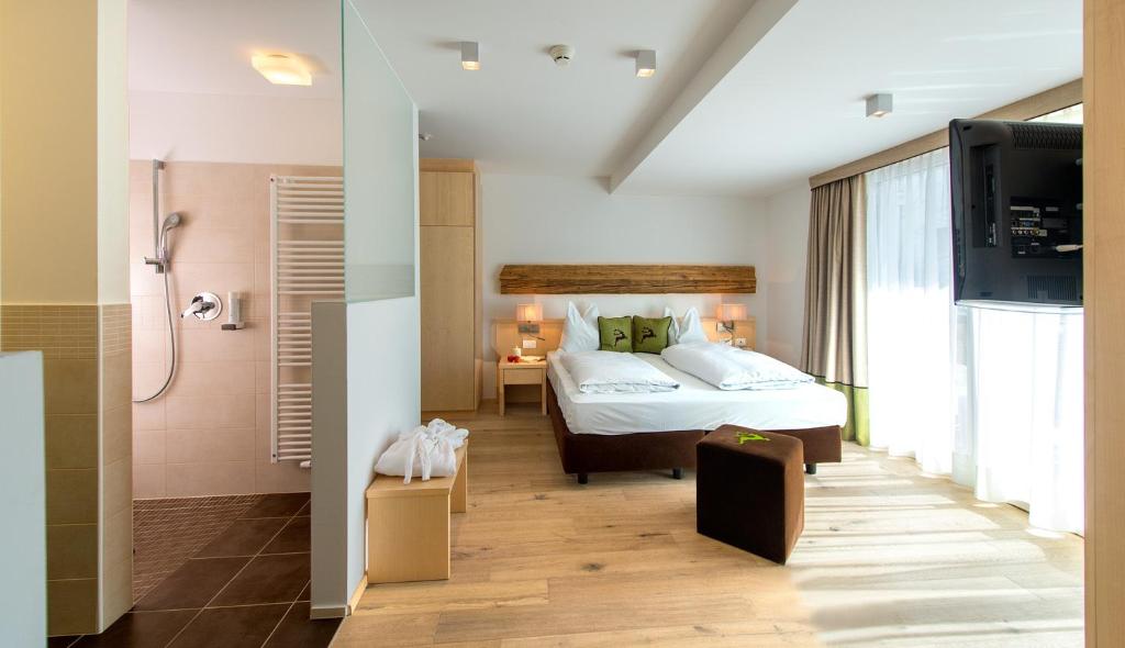 Postel nebo postele na pokoji v ubytování Hotel Regglbergerhof