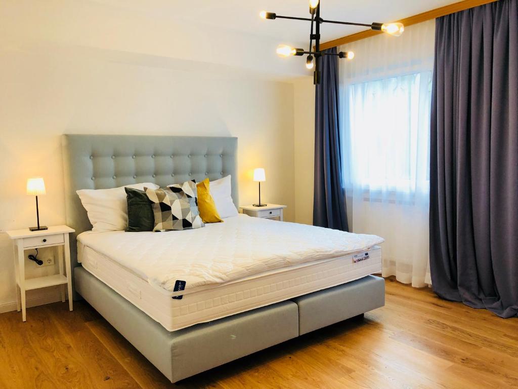 Postel nebo postele na pokoji v ubytování Rafael Kaiser Residence Privée - Spielberg Obdach