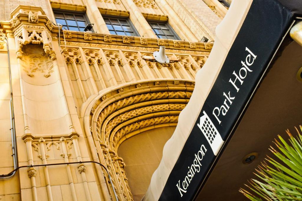 a building with a sign in front of it at Kensington Park Hotel in San Francisco