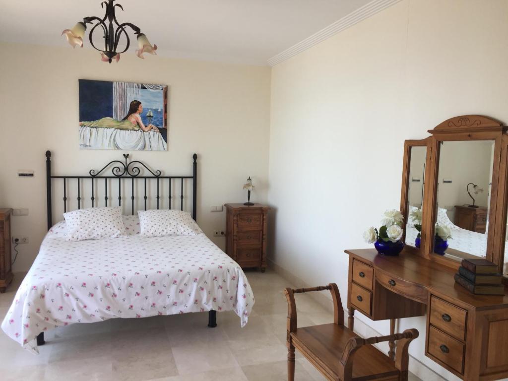 A bed or beds in a room at Urb Playa Azul 24