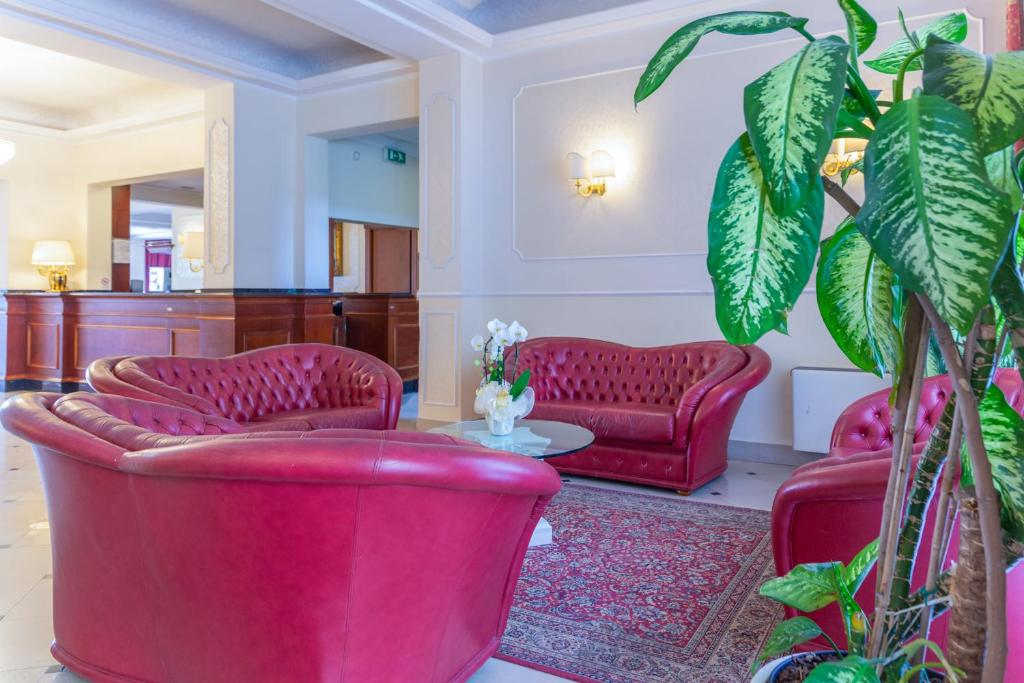 Posezení v ubytování Hotel Executive La Fiorita