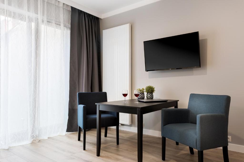 Televízia a/alebo spoločenská miestnosť v ubytovaní Liza Lux Apartments I Old Town