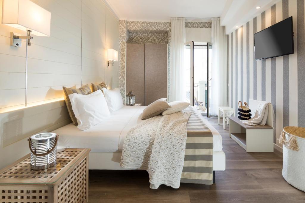 Postel nebo postele na pokoji v ubytování Hotel Atlantic Riviera Mare
