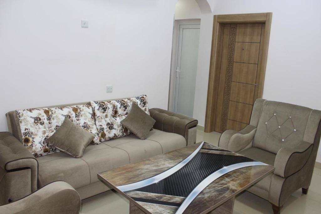 Posezení v ubytování Manarat Manah Hotel Apartments