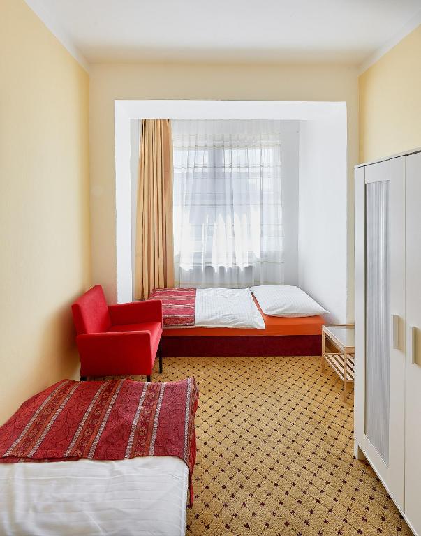 Postel nebo postele na pokoji v ubytování Penzion Karolinka