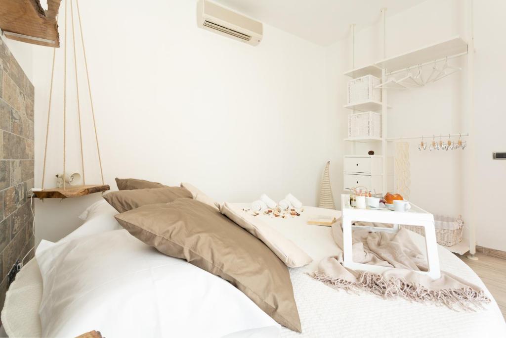 Łóżko lub łóżka w pokoju w obiekcie A'NACA HOLIDAY HOME