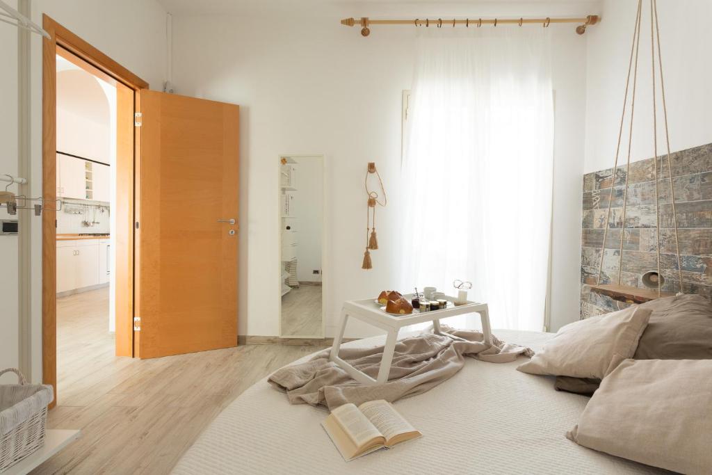 Łóżko lub łóżka w pokoju w obiekcie A'NACA HOLIDAY HOME