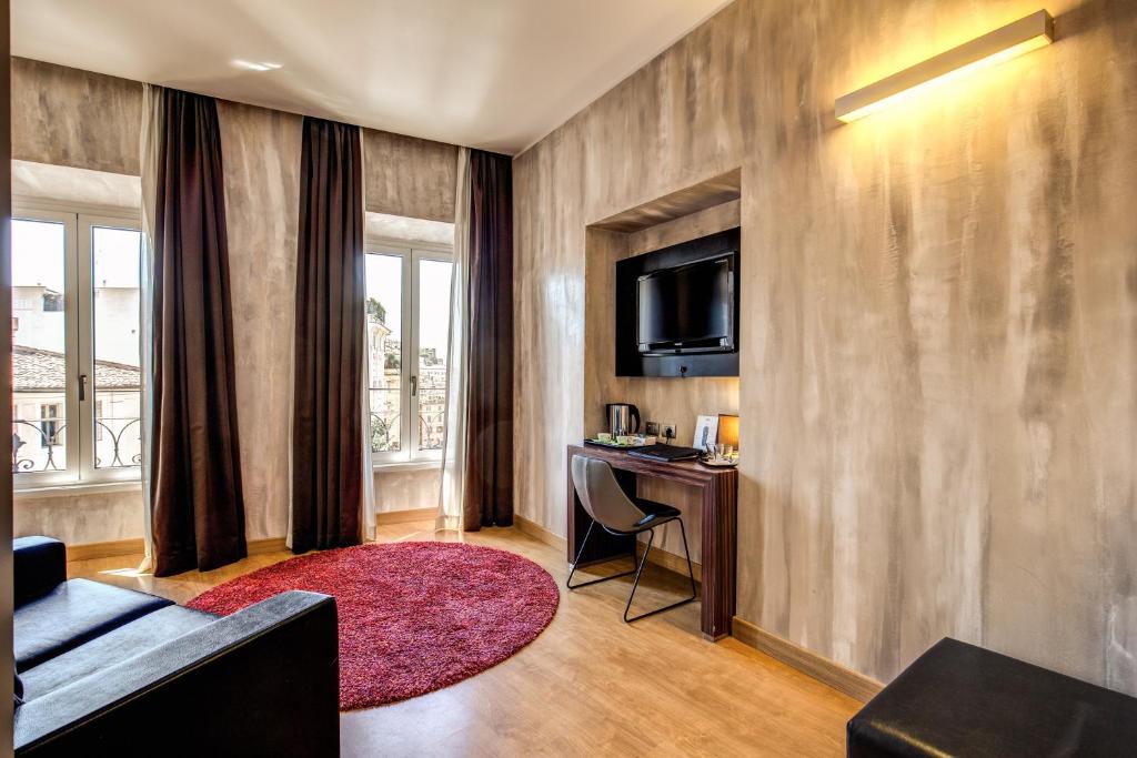 TV a/nebo společenská místnost v ubytování Trevi Collection Hotel - Gruppo Trevi Hotels