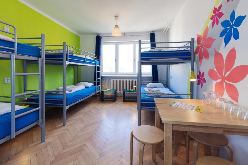 Postel nebo postele na pokoji v ubytování Patio Hostel