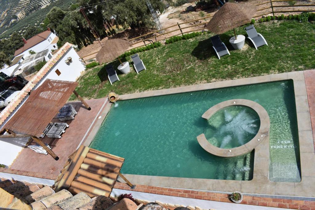 Vista de la piscina de Casa Fraskito o d'una piscina que hi ha a prop