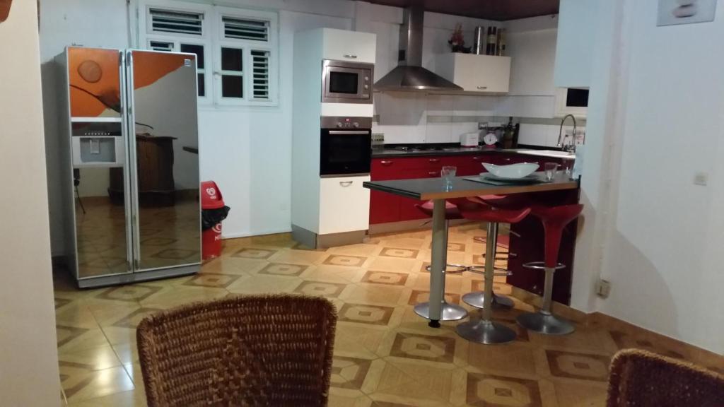 Kuchyň nebo kuchyňský kout v ubytování La Villa Rosier