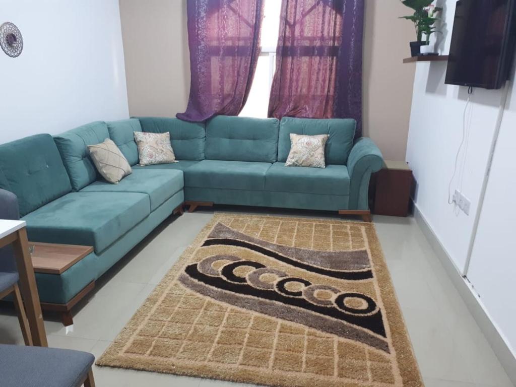 Posezení v ubytování Discovery Furnished Apartments (Al-Amerat)