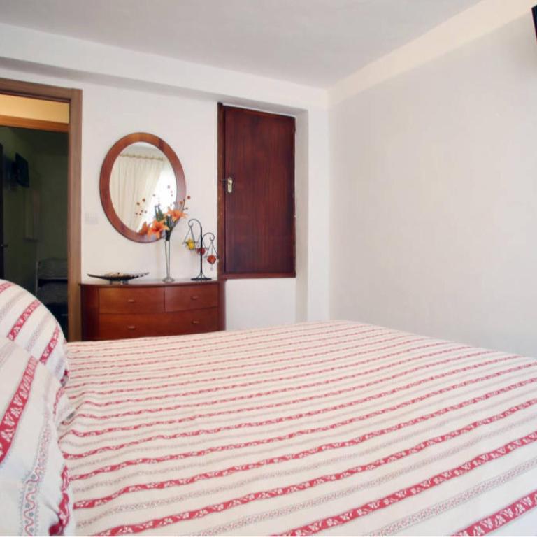 Postel nebo postele na pokoji v ubytování Casa las tres Conchas