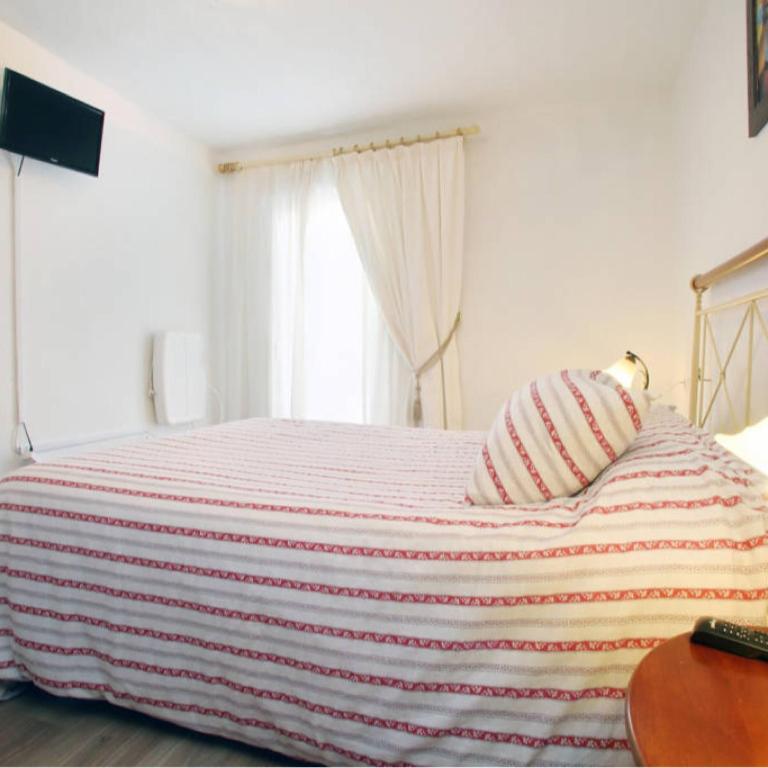Postel nebo postele na pokoji v ubytování Casa las tres Conchas