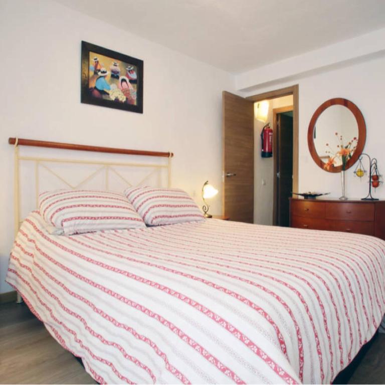 Postel nebo postele na pokoji v ubytování Casa las tres Conchas
