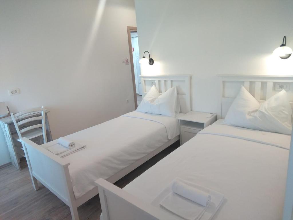 Postel nebo postele na pokoji v ubytování Casa Rossa Motovun