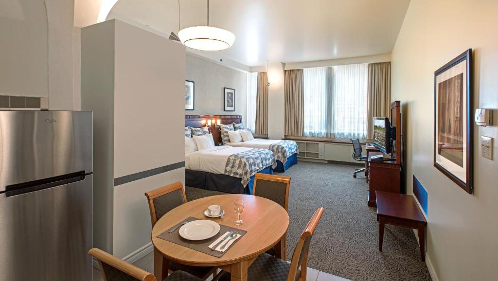 Posezení v ubytování Le Square Phillips Hôtel & Suites