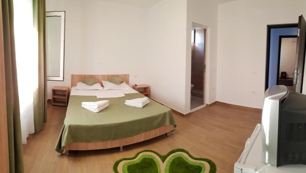Postel nebo postele na pokoji v ubytování Casa Enka