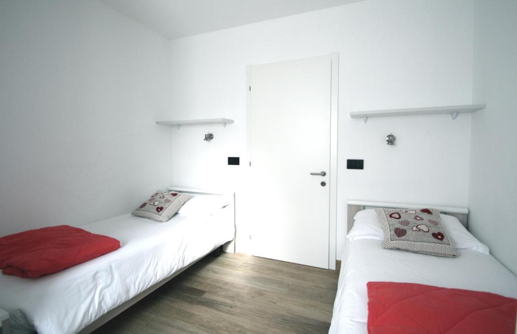 Postel nebo postele na pokoji v ubytování Casa ai Stabli