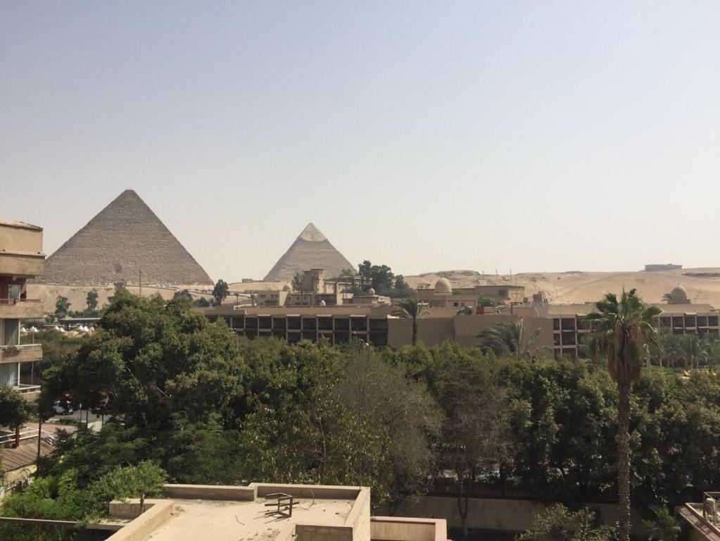 Afbeelding uit fotogalerij van H100 Pyramids View in Giza