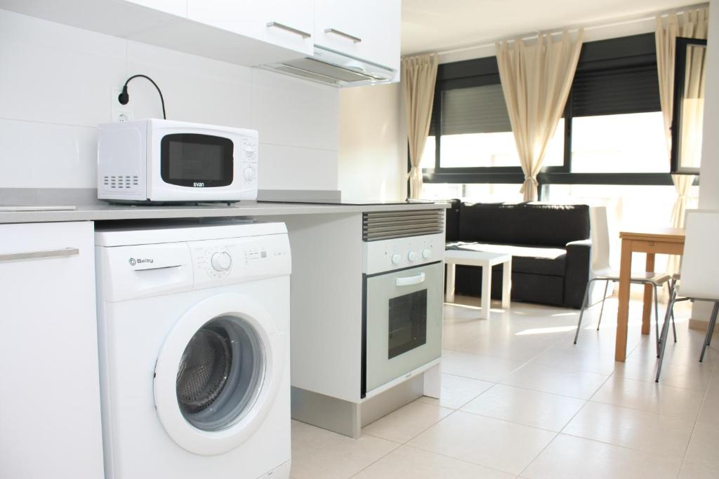 Kuchyň nebo kuchyňský kout v ubytování Apartamento Plaza Felipe V Inmomart